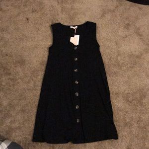 Black knit dress with buttons
